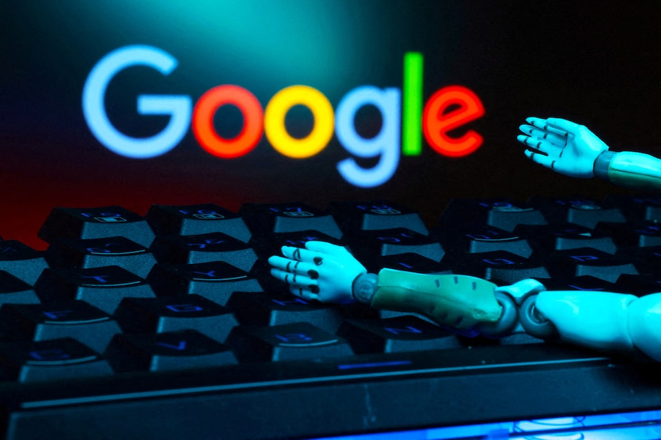 Illustration shows Google logo, keyboard and robot hands