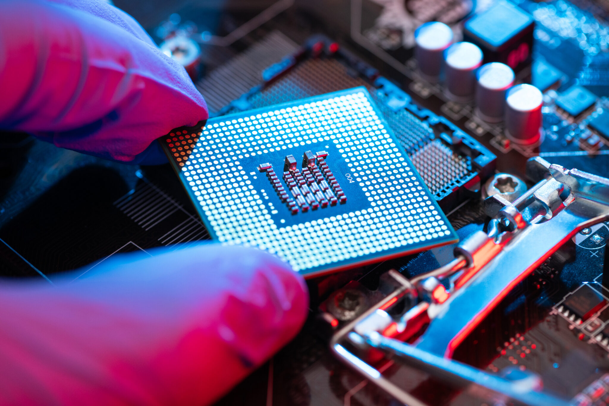 The close-up view of a CPU socket on a computer motherboard. The intricate circuitry and components highlight the precision and complexity of modern technology, ideal for electronics and artificial intelligence.